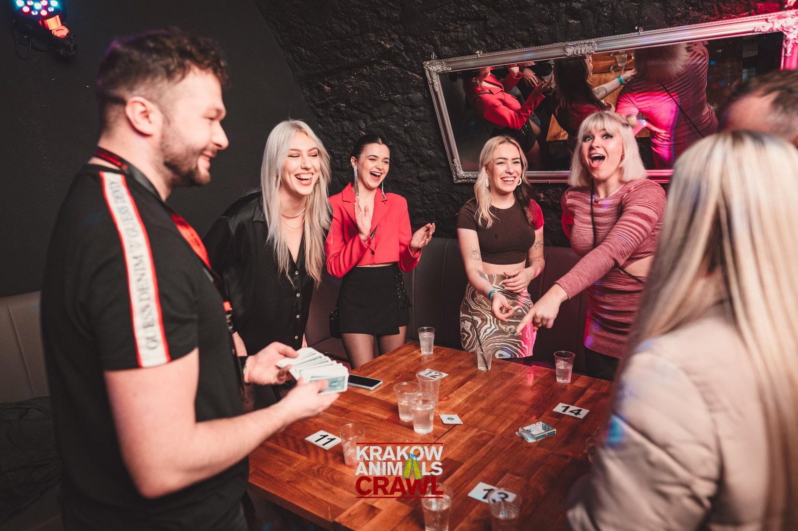 Guests playing Kings Cup during the opening games